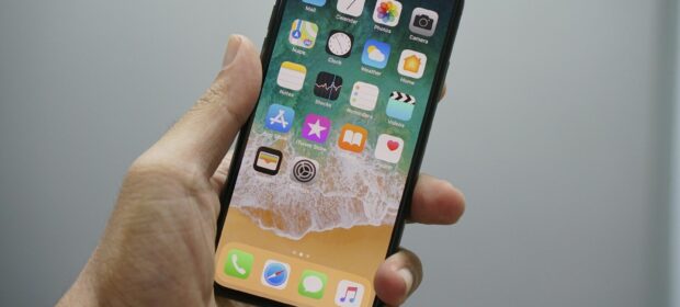 person holding space gray iPhone 7